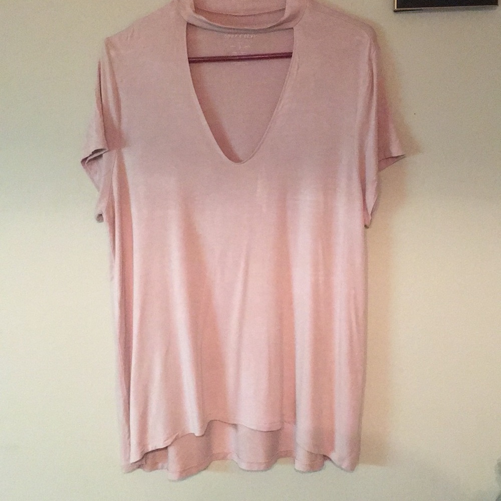 Pink top with a low v neck